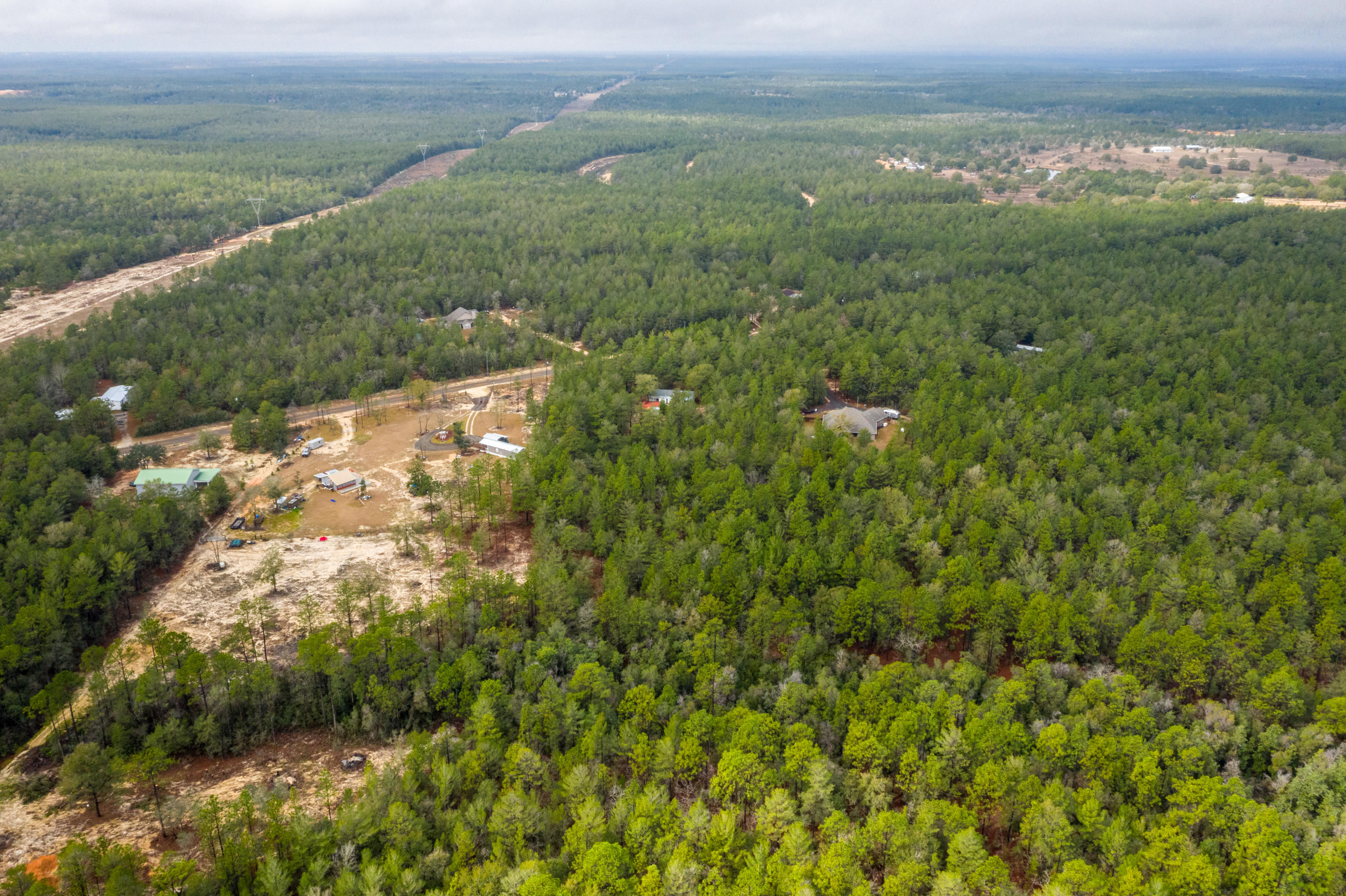 1504 Hinote Road DeFuniak Springs, FL 32433 - Photo 4 of 21 a view of a field with an ocean