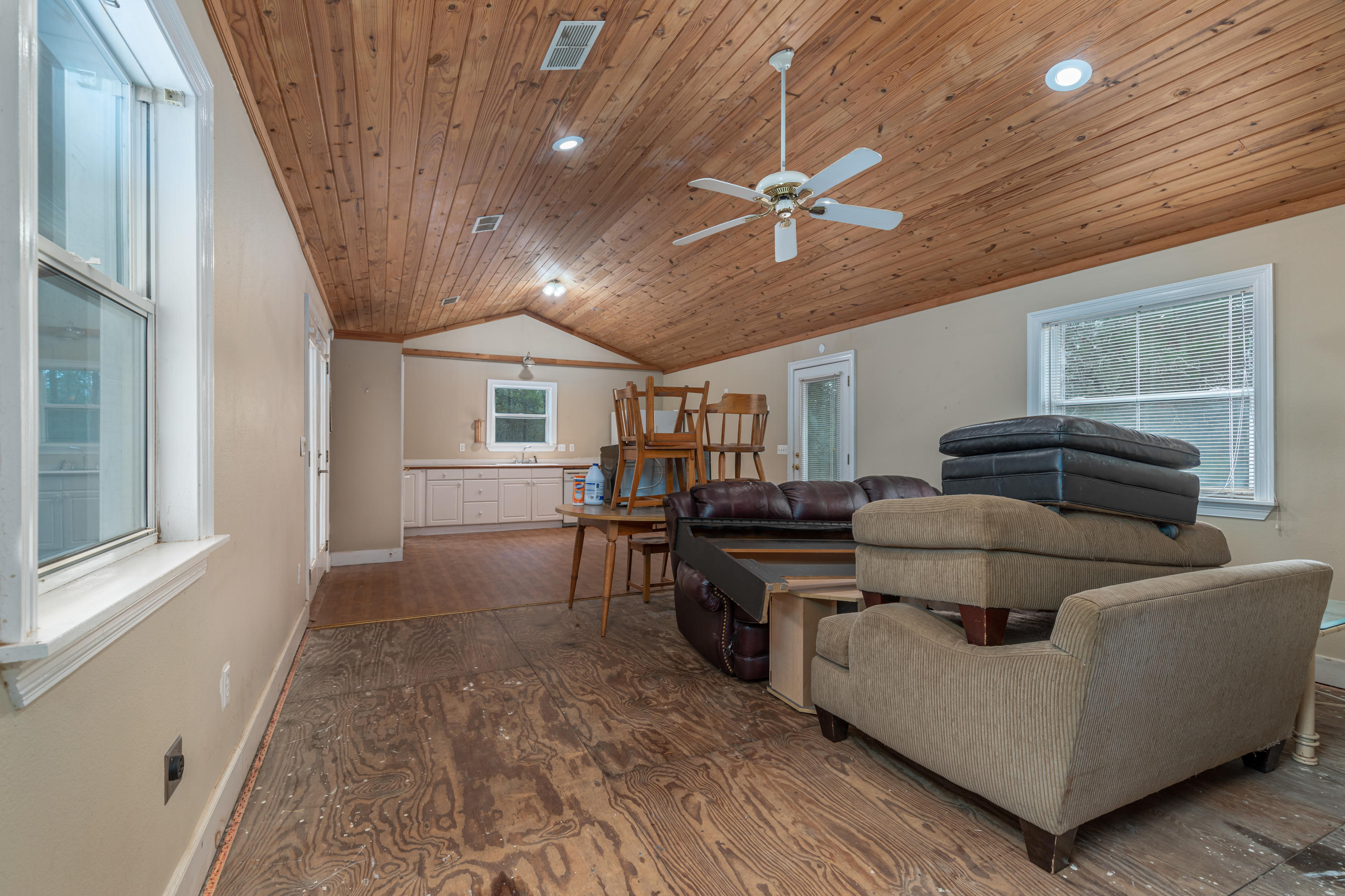 1504 Hinote Road DeFuniak Springs, FL 32433 - Photo 7 of 21 a living room with furniture and a wooden floor