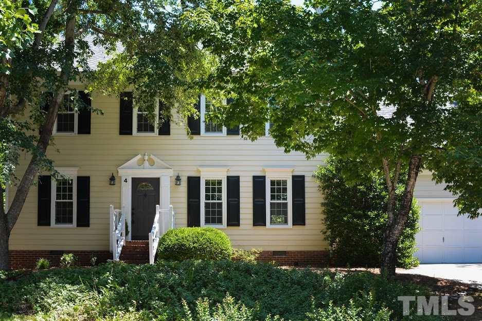 4 Swallows Ridge Court Durham, NC 27713 - Photo 1 of 18 a view of a white house next to a yard