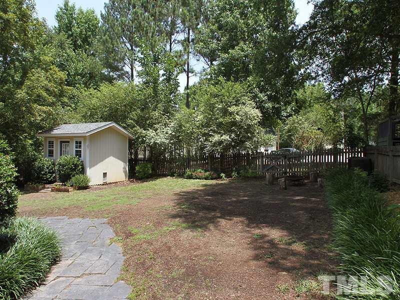 4 Swallows Ridge Court Durham, NC 27713 - Photo 17 of 18 a view of a house with a yard