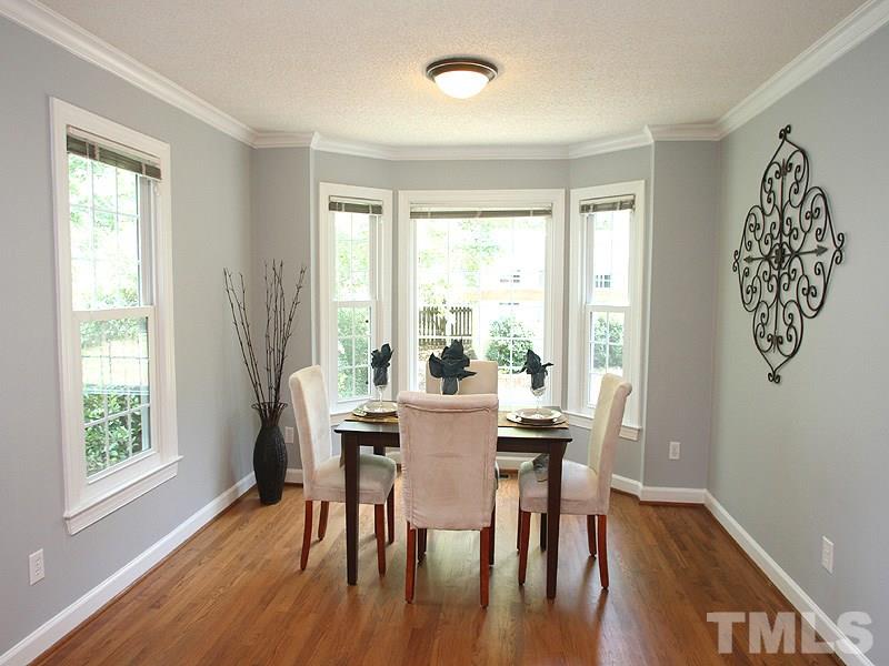 4 Swallows Ridge Court Durham, NC 27713 - Photo 3 of 18 a view of a dining room with furniture window and outside view