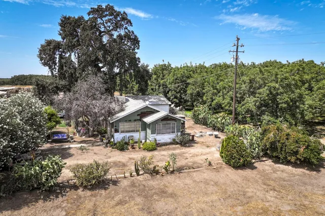 a house view with a outdoor space