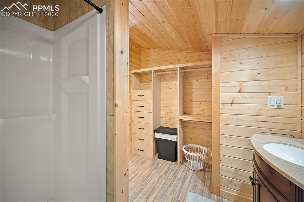 213 Willow Road Divide, CO 80814 - Photo 25 of 49 a bathroom with a sink a toilet and shower