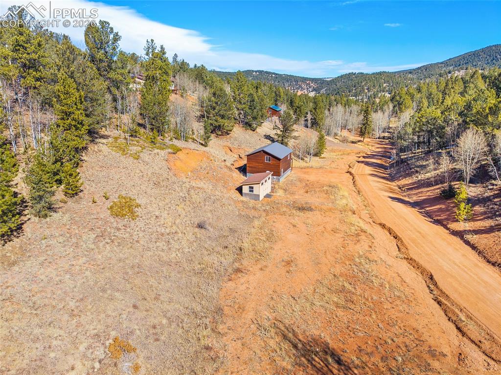213 Willow Road Divide, CO 80814 - Photo 45 of 49 a view of a terrace with mountain view