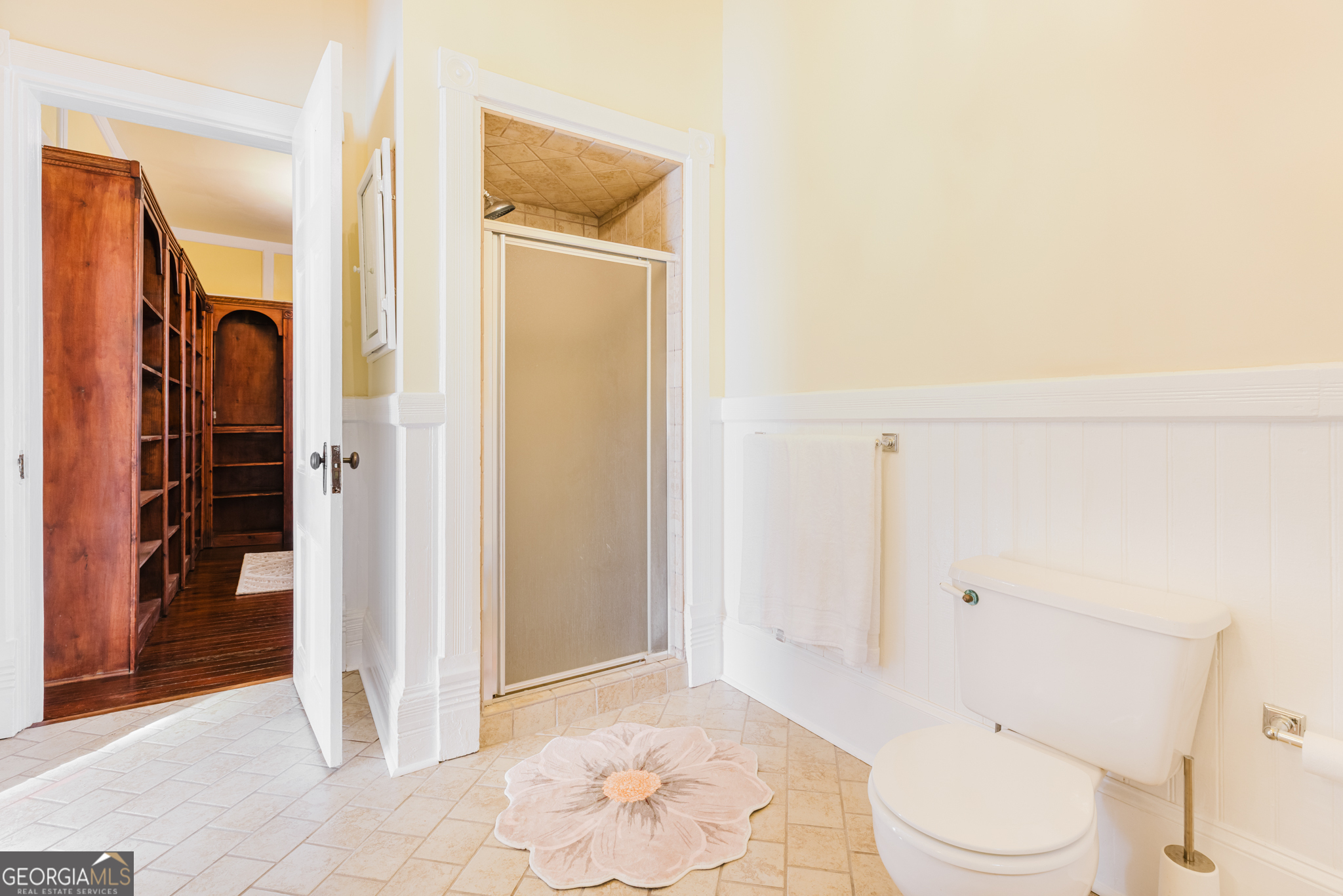 1202 South Lee Street Americus, GA 31709 - Photo 14 of 54 a bathroom with a toilet and a shower