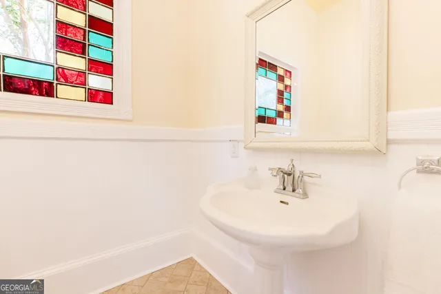 a bathroom with a sink and a bathtub
