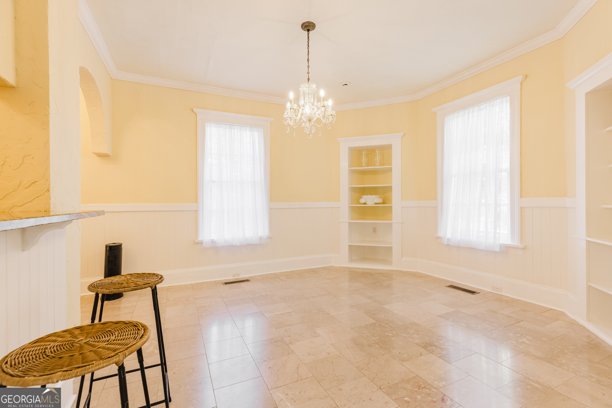 1202 South Lee Street Americus, GA 31709 - Photo 17 of 54 a view of an empty room with a window