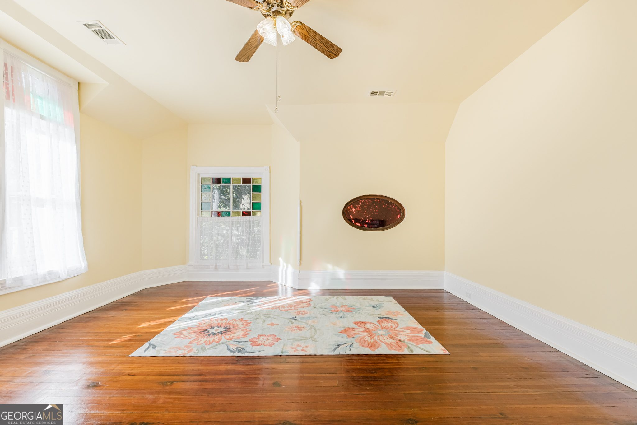 1202 South Lee Street Americus, GA 31709 - Photo 37 of 54 a view of a livingroom with wooden floor
