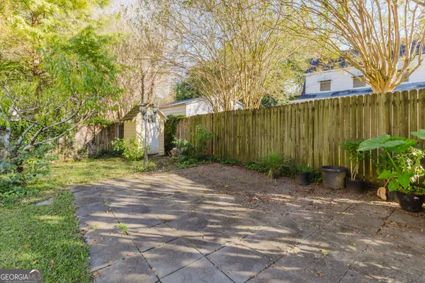 a view of yard with trees