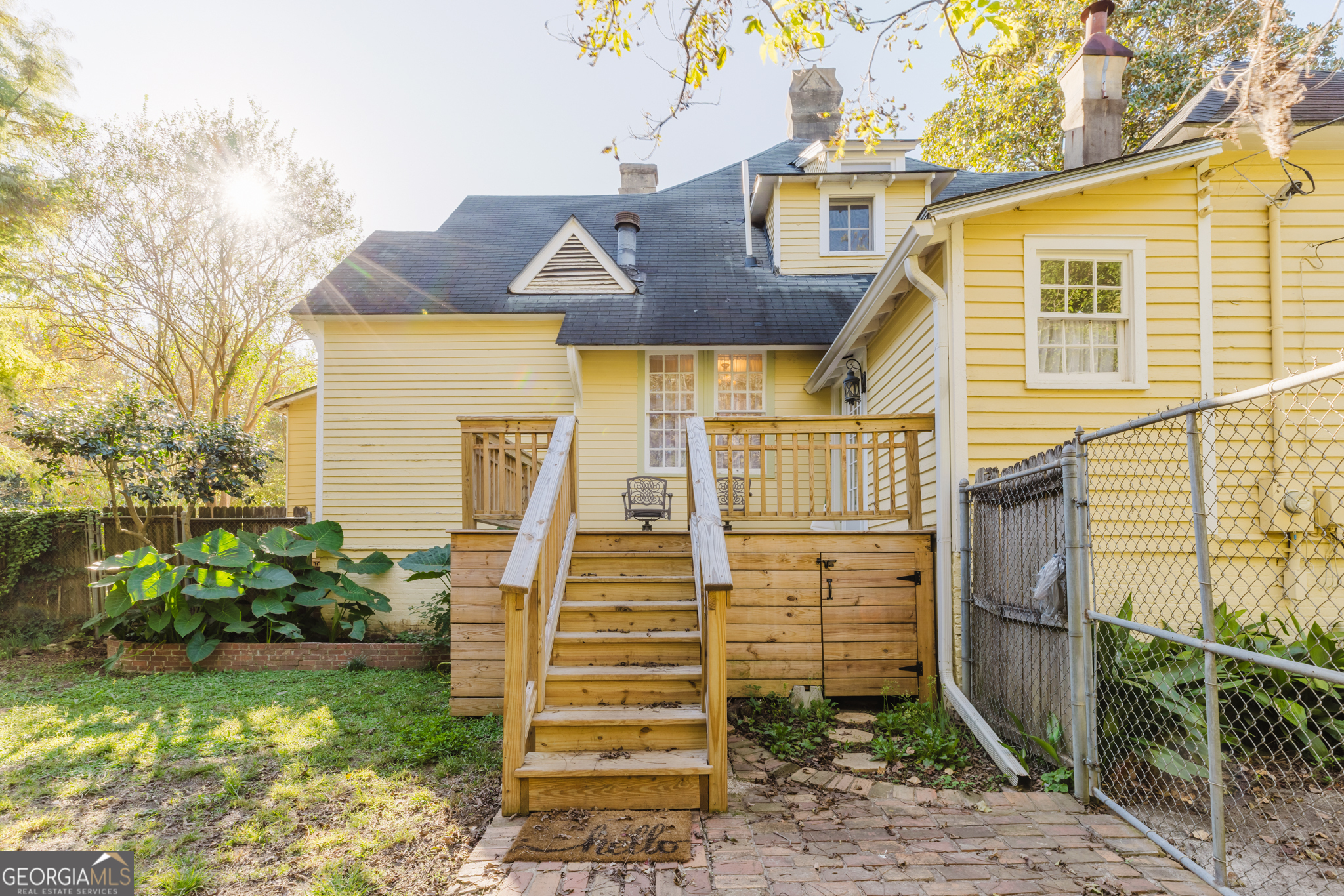 1202 South Lee Street Americus, GA 31709 - Photo 48 of 54 a front view of a house with garden
