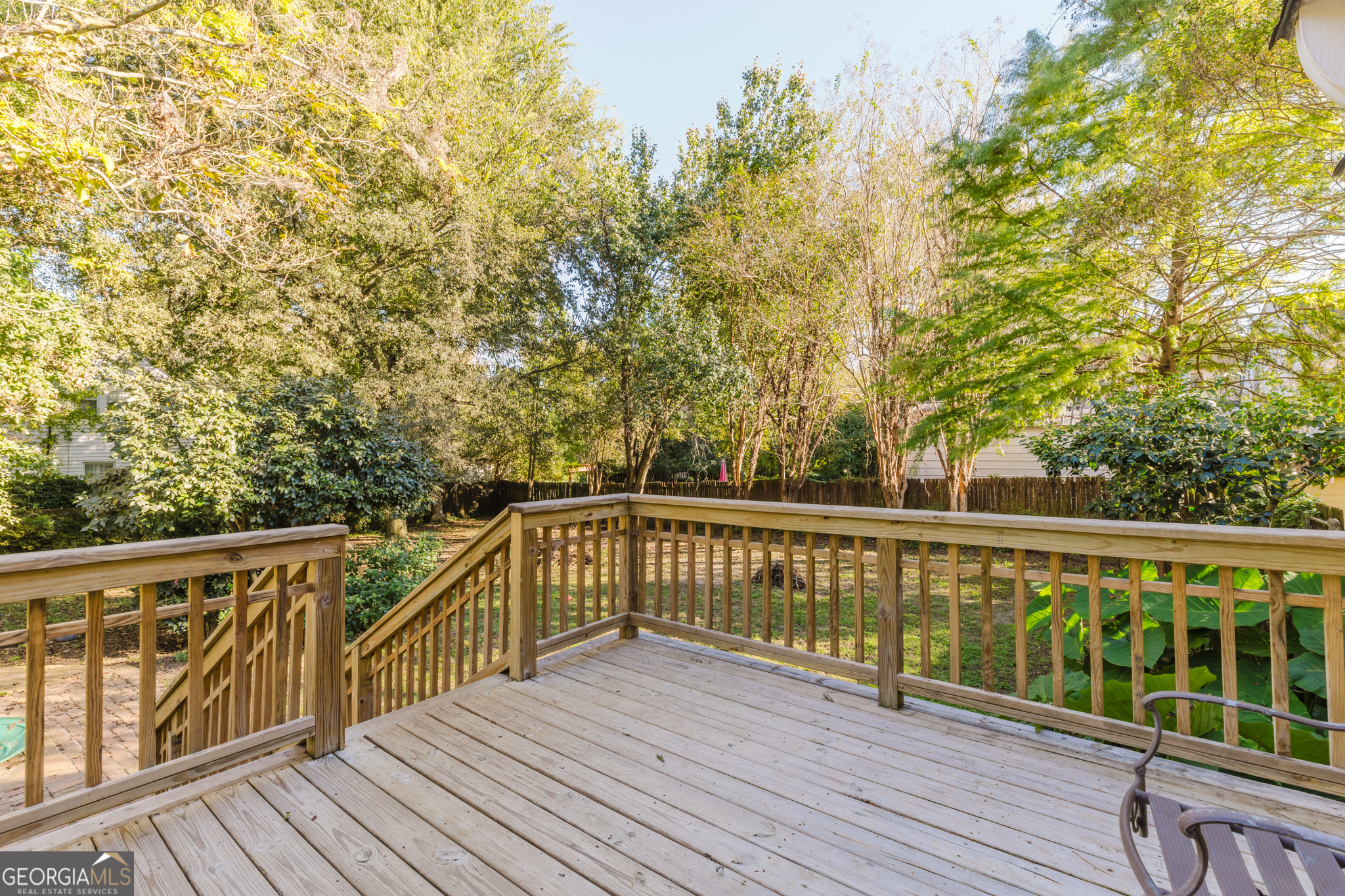 1202 South Lee Street Americus, GA 31709 - Photo 50 of 54 a view of balcony with wooden floor and fence