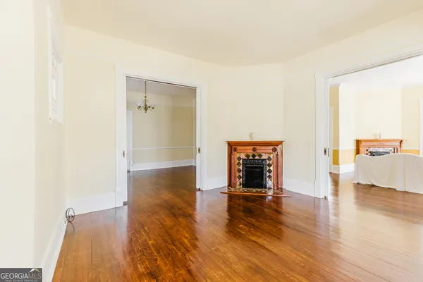 a view of a livingroom with wooden floor