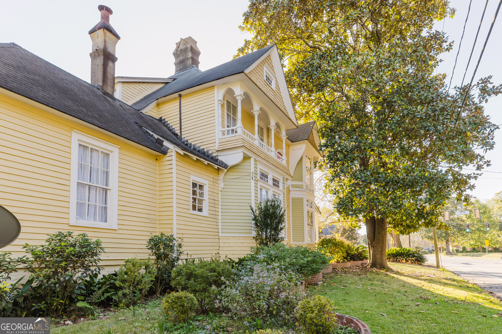 1202 South Lee Street Americus, GA 31709 - Photo 53 of 54 a front view of a house with a yard