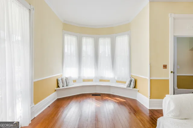 a view of an empty room and window