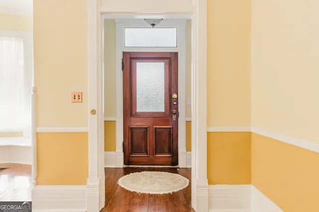 a bathroom with a toilet tub and a shower