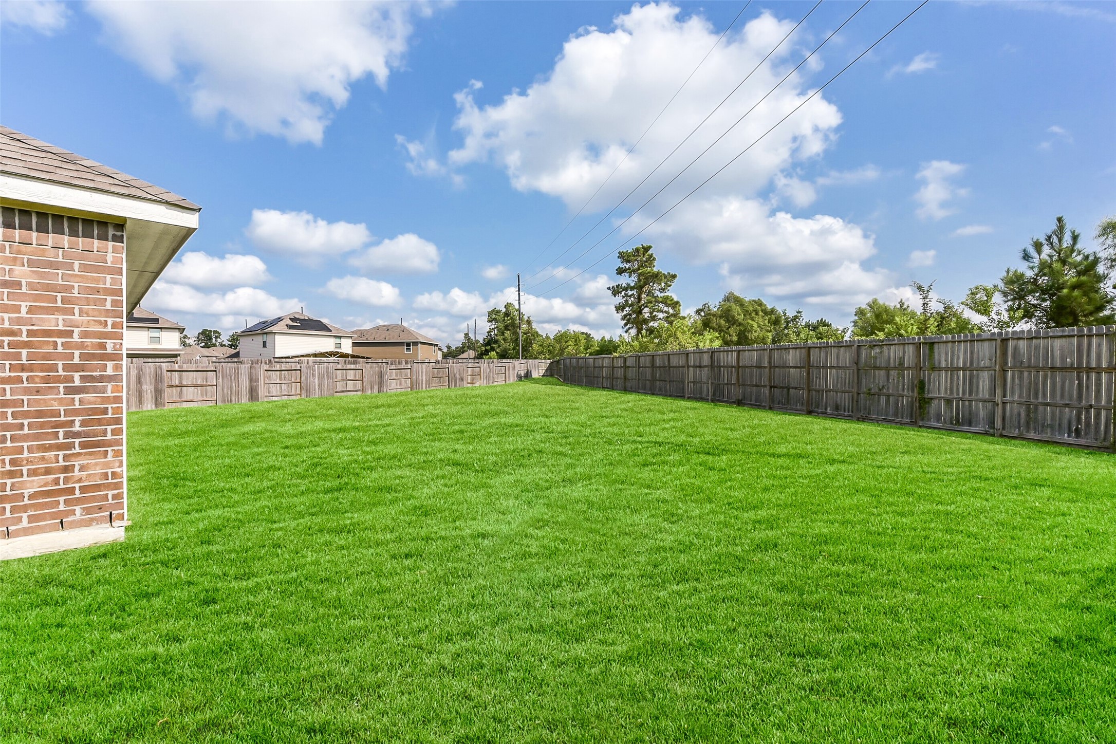 3003 Marble Rise Trail Kingwood, TX 77365 - Photo 23 of 25 a view of a garden with a big yard