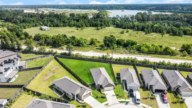 a view of a lake with a house