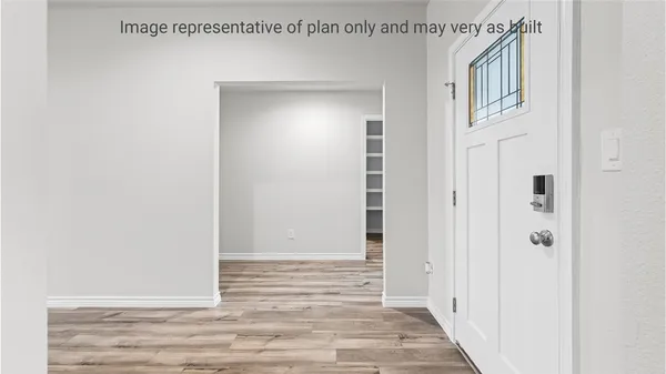 a view of a hallway with entryway