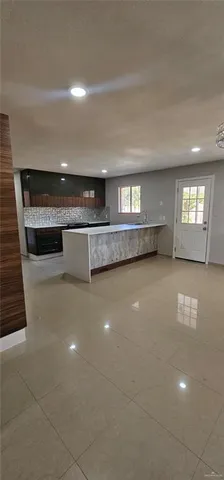 a view of kitchen and window