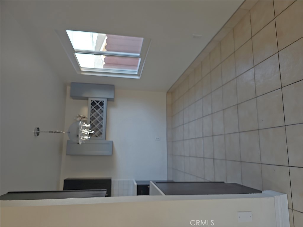 4133 Downing Avenue, Unit B Baldwin Park, CA 91706 - Photo 4 of 12 a bathroom with a bathtub