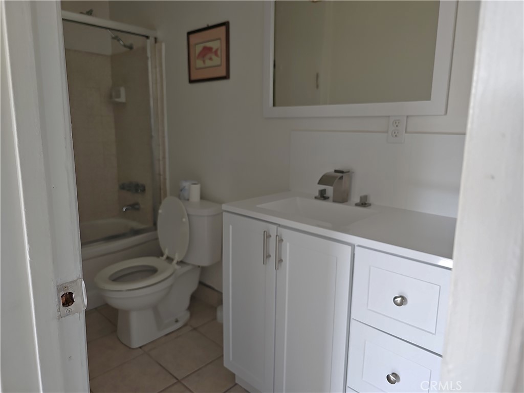 4133 Downing Avenue, Unit B Baldwin Park, CA 91706 - Photo 5 of 12 a bathroom with a sink a toilet and shower
