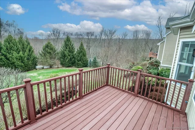 a view of a backyard with pathway