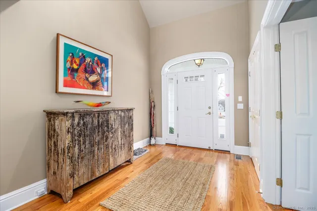 a view of a hallway with entryway