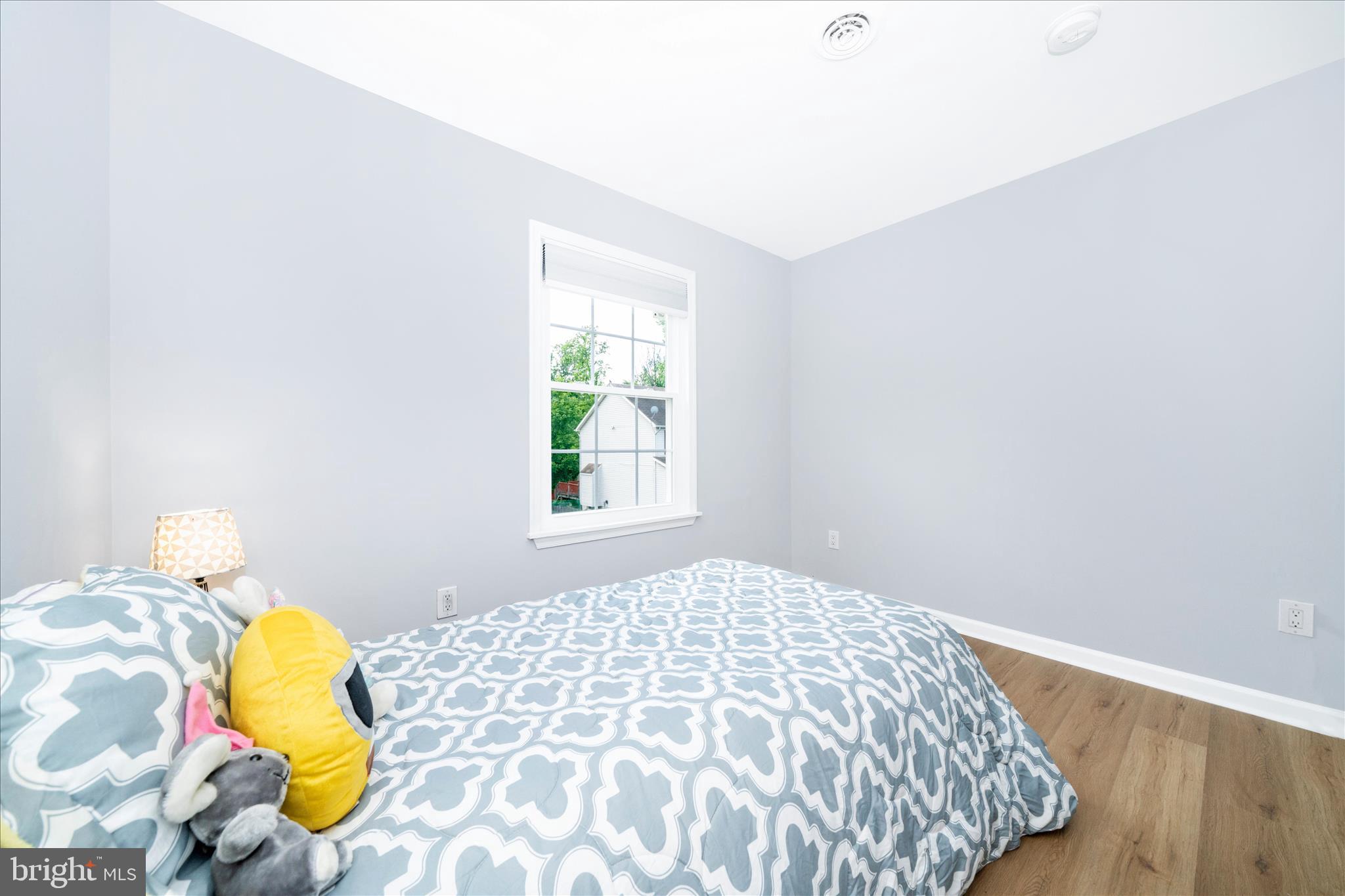 713 Seek Lane Silver Spring, MD 20912 - Photo 26 of 60 a bedroom with a bed and a window