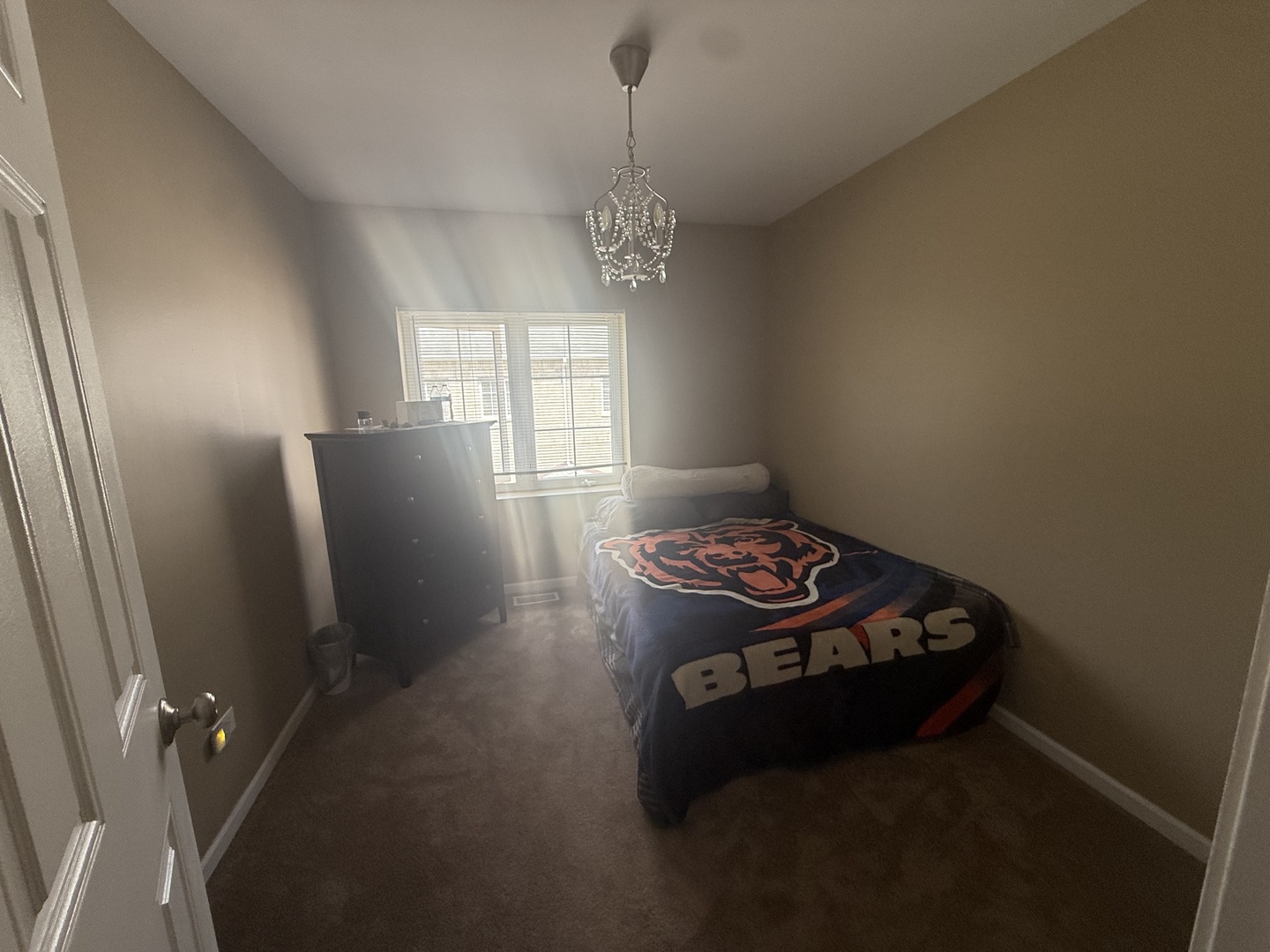183 East River Road, Unit C1 Des Plaines, IL 60016 - Photo 15 of 25 a living room with couch and a window