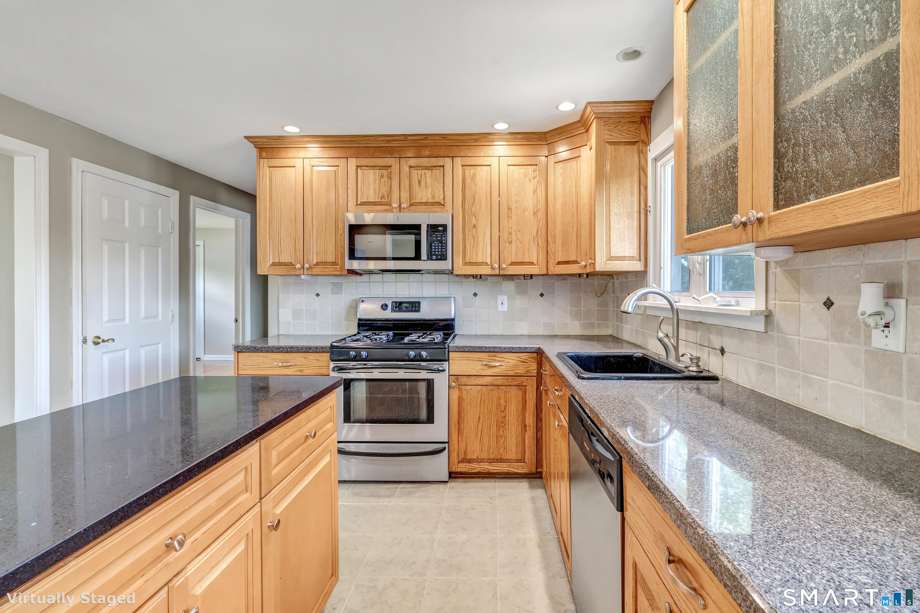 175 Post Oak Road Stratford, CT 06614 - Photo 12 of 33 KITCHEN COUNTERTOPS