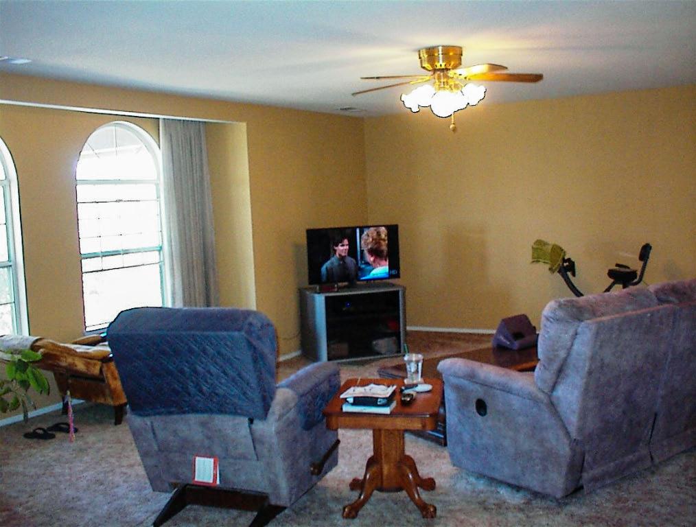 32860 George Smith Road Squaw Valley, CA 93675 - Photo 12 of 35 a living room with furniture and a fireplace