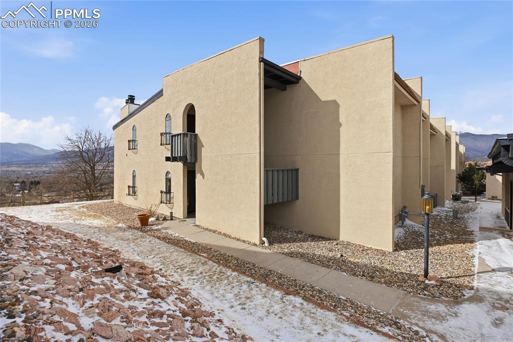 930 Fontmore Road, Unit C Colorado Springs, CO 80904 - Photo 1 of 32 a view of a house with a backyard