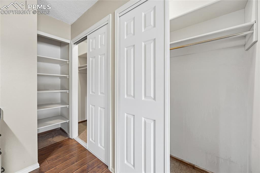 930 Fontmore Road, Unit C Colorado Springs, CO 80904 - Photo 24 of 32 a view of a hallway with wooden floor and entryway