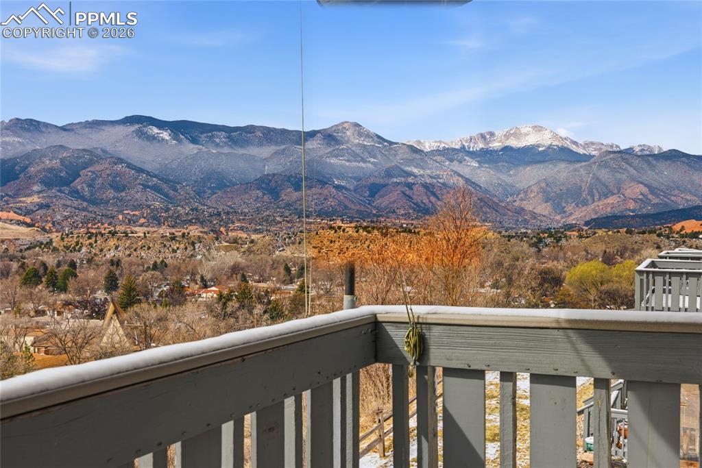 930 Fontmore Road, Unit C Colorado Springs, CO 80904 - Photo 30 of 32 a view of city and mountain from a balcony