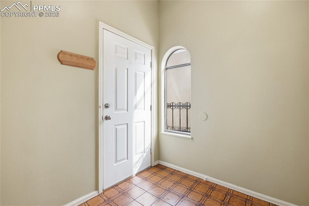 930 Fontmore Road, Unit C Colorado Springs, CO 80904 - Photo 7 of 32 an empty room with windows
