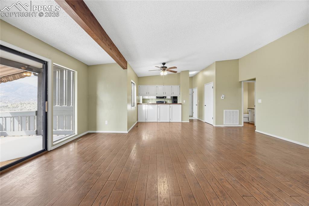 930 Fontmore Road, Unit C Colorado Springs, CO 80904 - Photo 8 of 32 a view of a livingroom with wooden floor