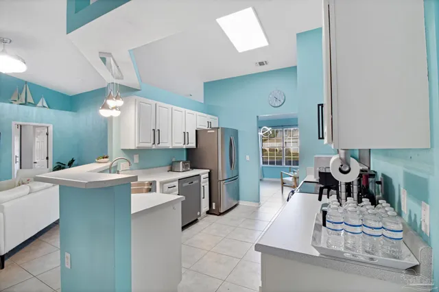 a kitchen with a sink and counter top space