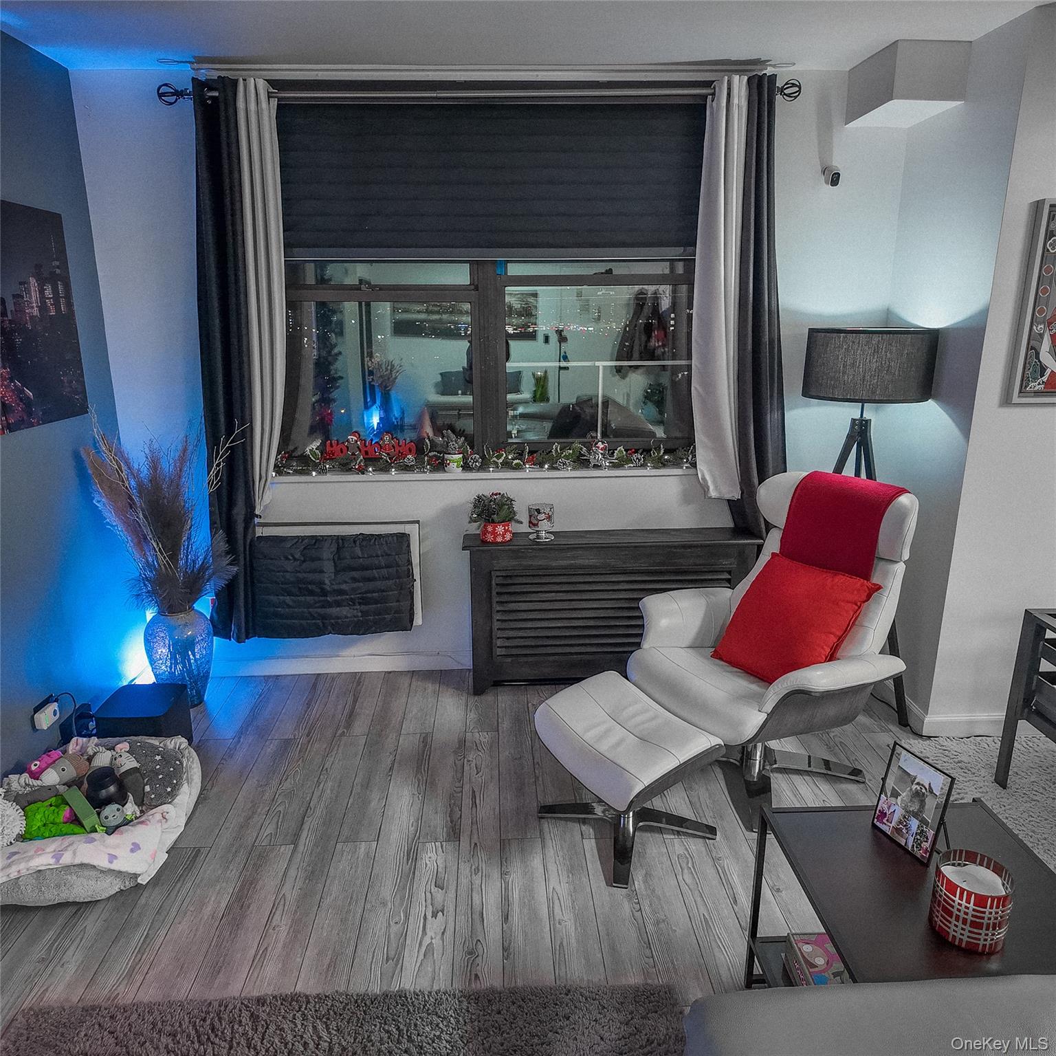 1966 Newbold Avenue, Unit 904 Bronx, NY 10472 - Photo 13 of 15 a living room with furniture and a fireplace