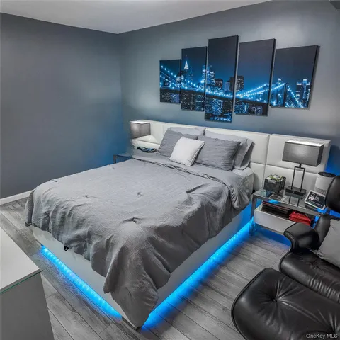 a bedroom with bed and window