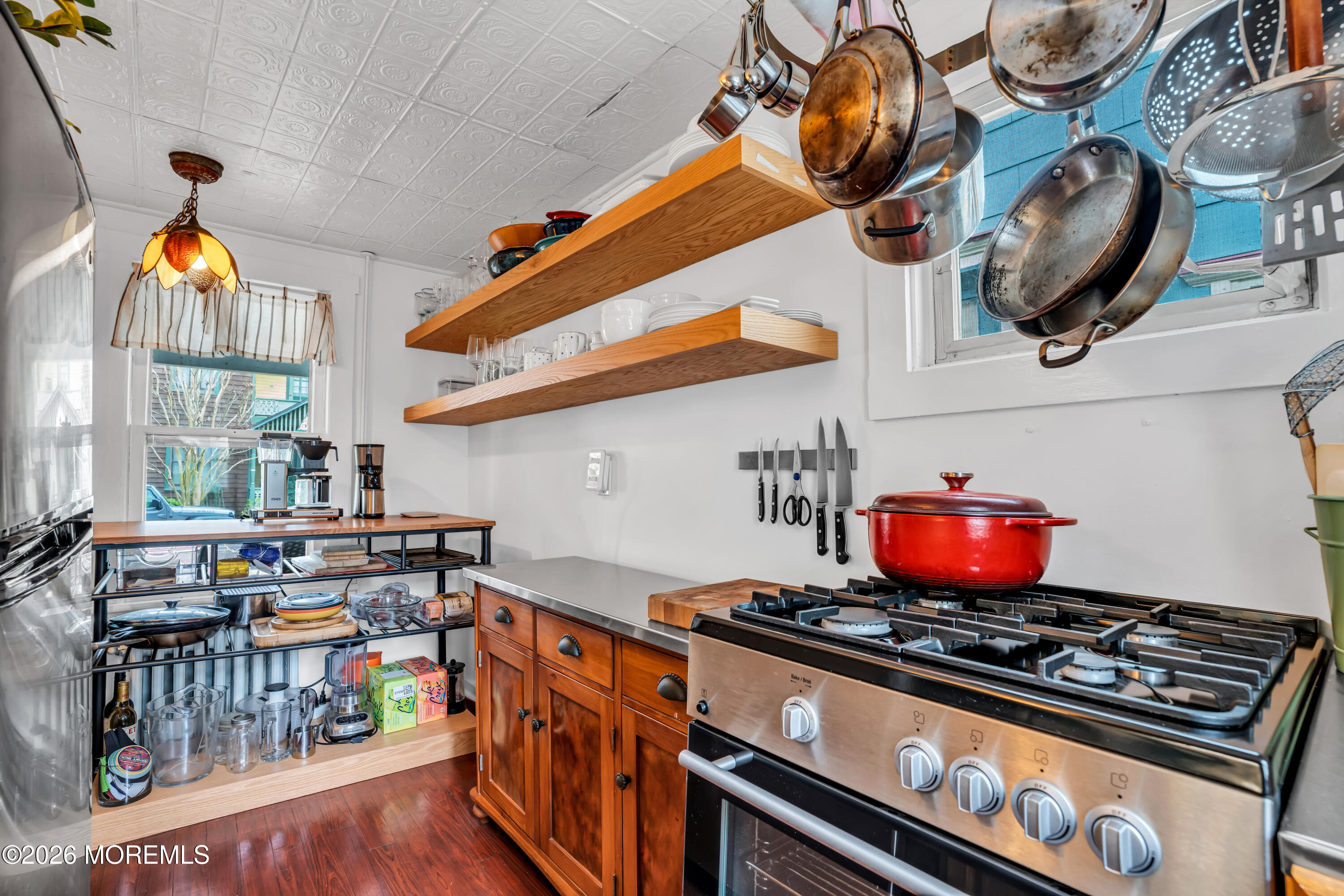 119 Pilgrim Pathway Ocean Grove, NJ 07756 - Photo 1 of 26 a kitchen with a stove and a wooden floor