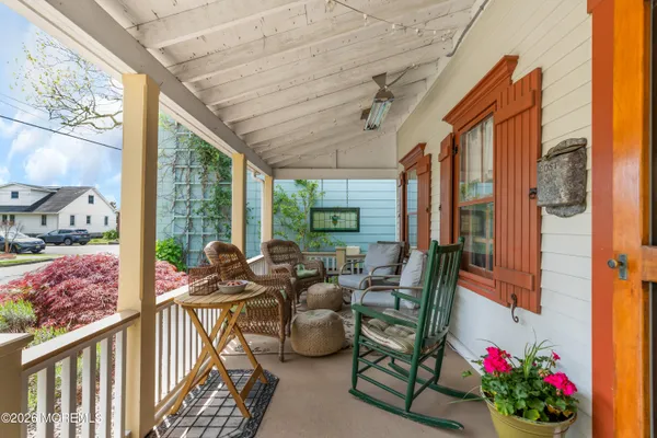 a view of balcony with furniture