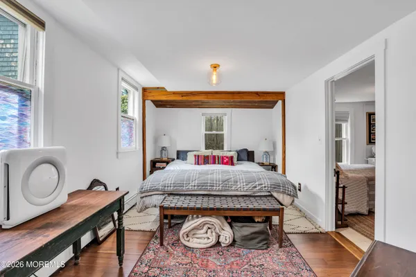 a view of livingroom with furniture and wooden floor