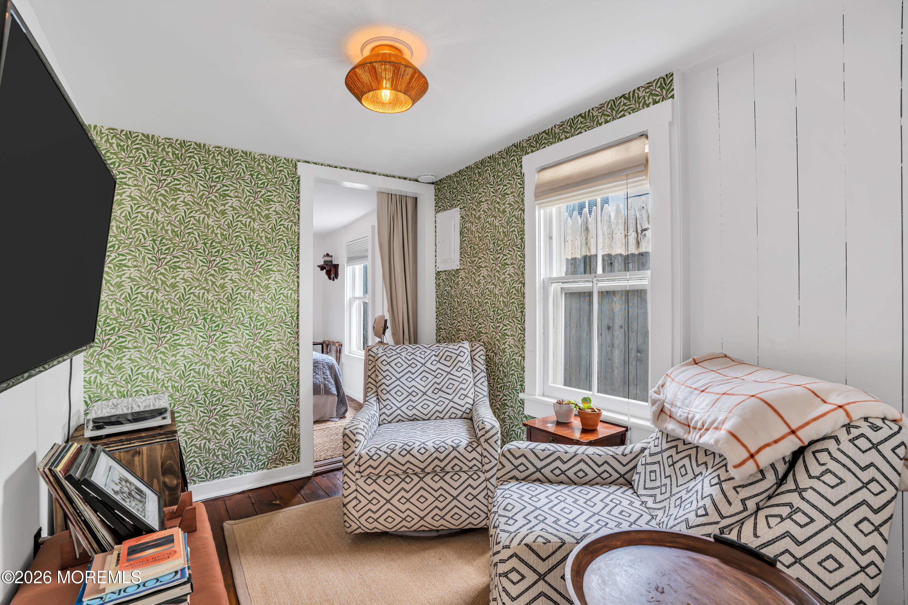 119 Pilgrim Pathway Ocean Grove, NJ 07756 - Photo 23 of 26 a bedroom with a bed and a couch