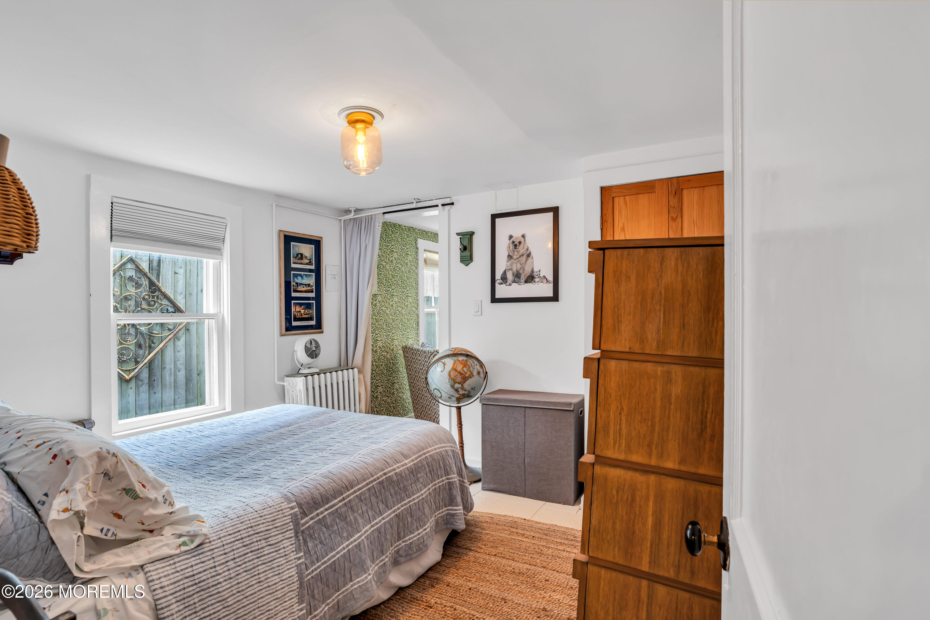 119 Pilgrim Pathway Ocean Grove, NJ 07756 - Photo 26 of 26 a bedroom with a bed and a window