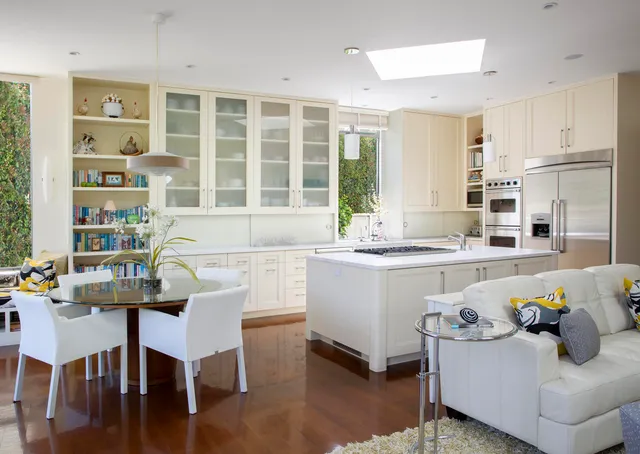 a living room with furniture a rug and a fireplace