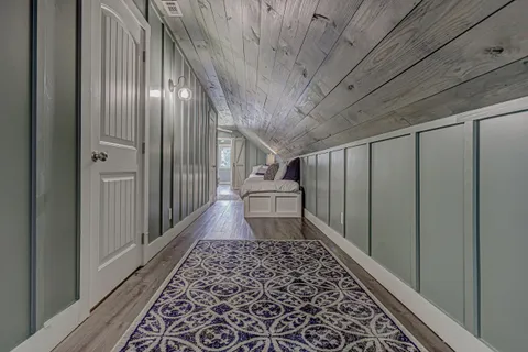 a bedroom with a bed and a view of bathroom