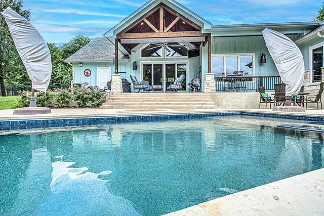 a view of a house with a lake view