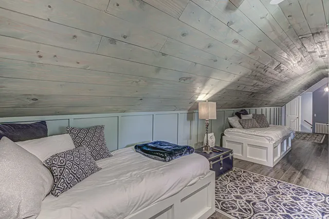 a view of a chair and tables in the balcony