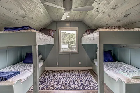 a view of a backyard with sitting area