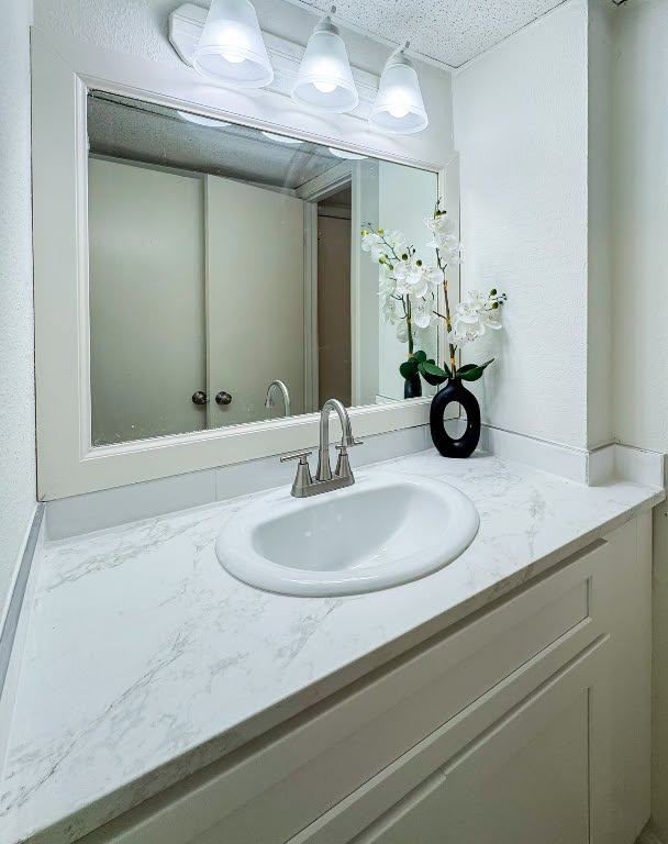 5810 Sweeney Circle, Unit D Austin, TX 78723 - Photo 17 of 18 Bathroom with vanity